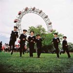 Photo of Vienna Boys Choir in front of Ferris Wheel